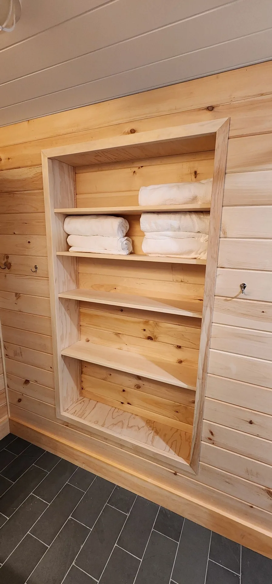 Built-in towel shelf