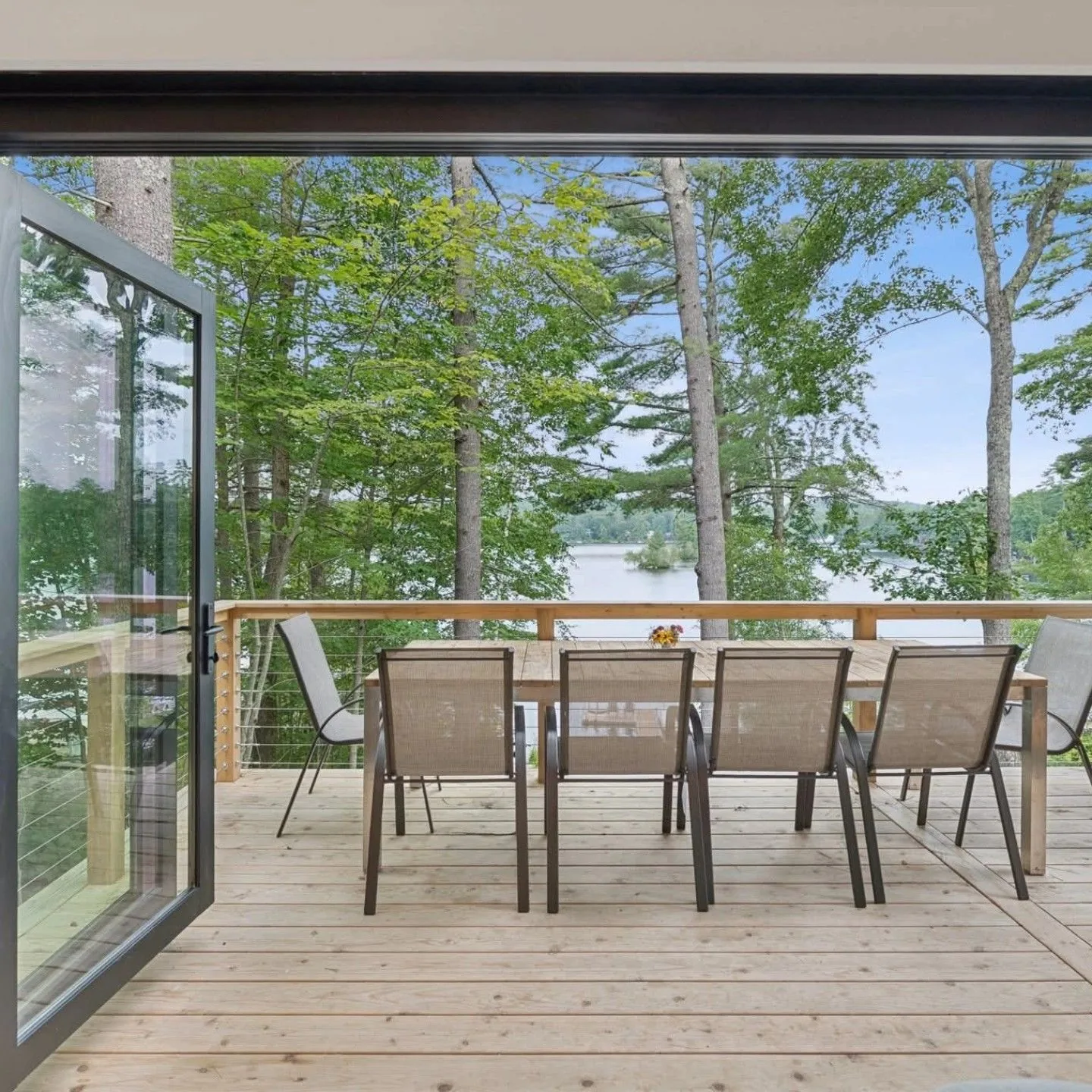 Lakeside custom deck and outdoor dining area